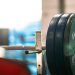 black and gray barbell bar